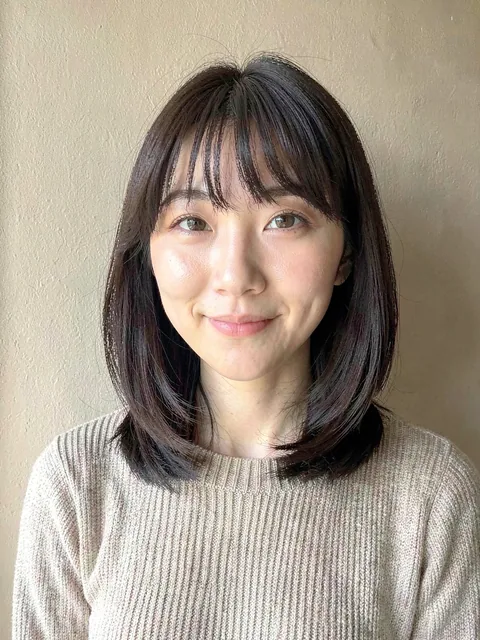 Before: Wolf cut with curtain bangs